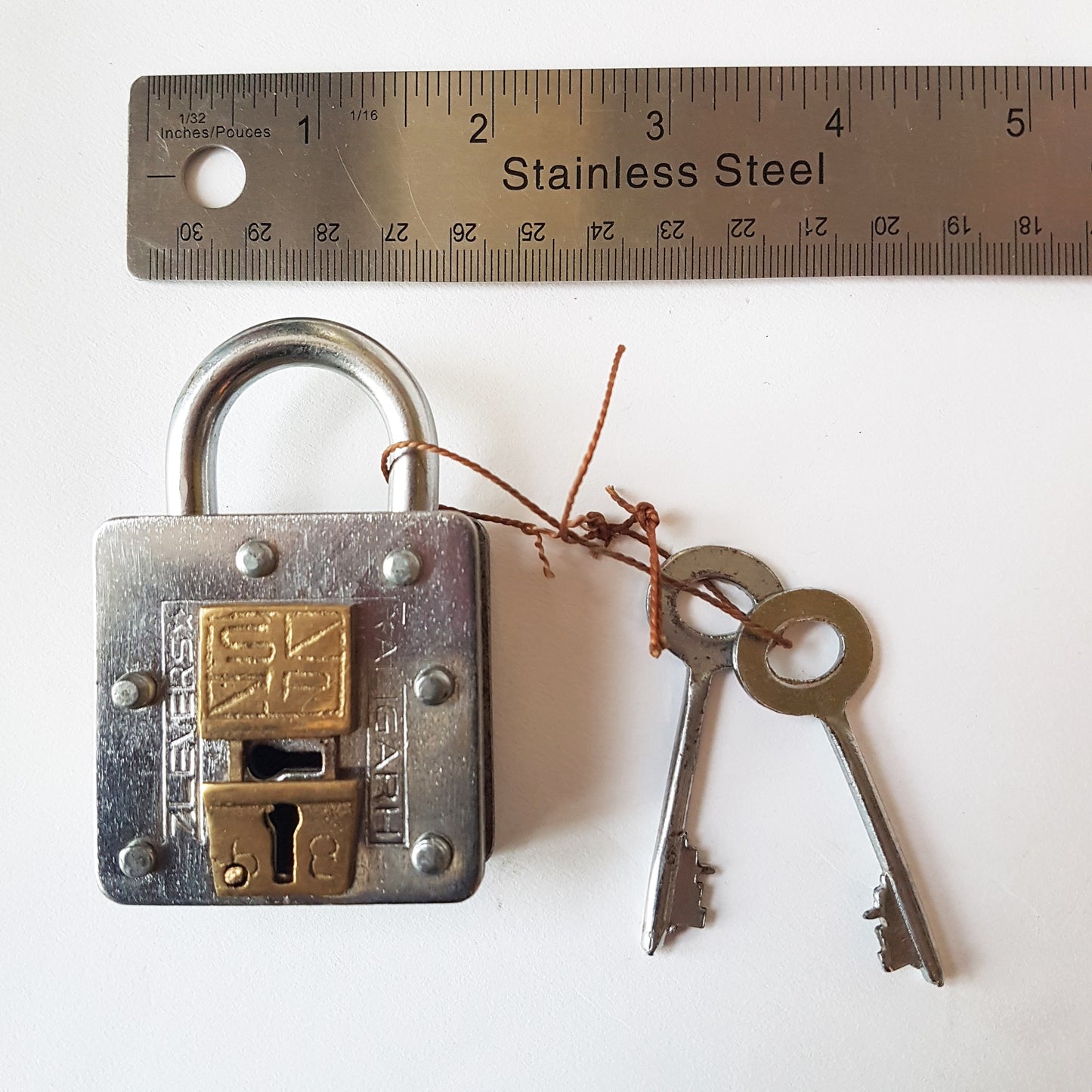 Pad lock, antique 2 key puzzle lock. Functional pad lock with tricky hidden key hole. Collectible vintage pad lock, 2 key lock.