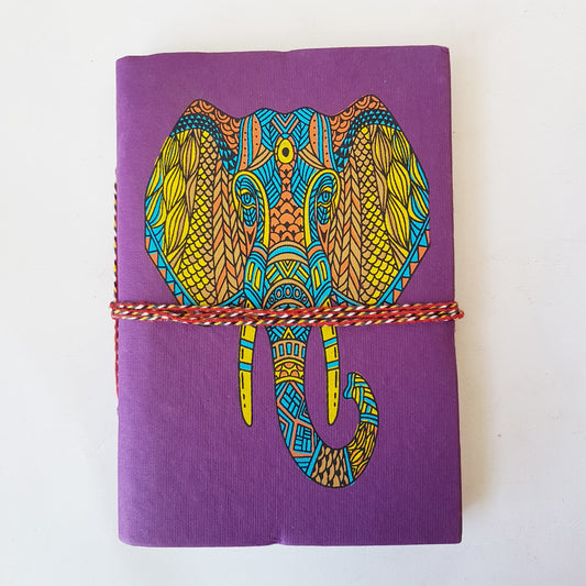 Purple elephant journal with lined pages. 5x7 inch purple hardcover notebook.