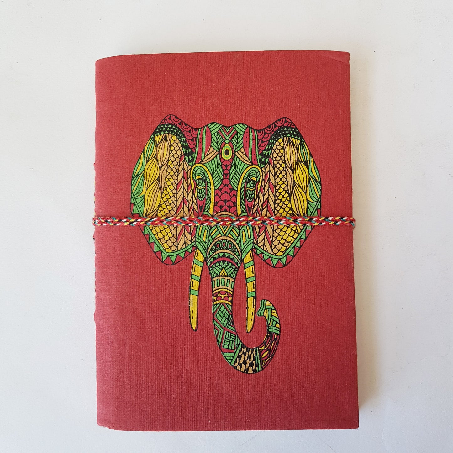 Elephant notebook journal 5x7 inches. Red hand bound hard cover lined diary with a colorful psychedelic elephant design. Free shipping CA & USA.