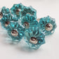 Set of 8 turquoise crystal cabinet knobs.  8 cabinet knob drawer pulls with silver fittings for affordable and easy diy home decor update. .