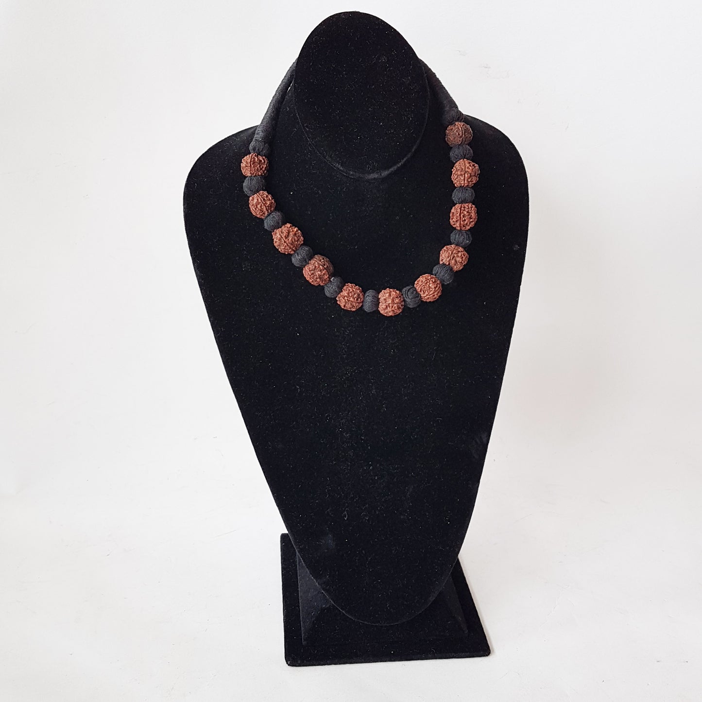 Sacred bead natural Rudraksha Yoga meditation necklace with traditional hand-knotted cotton cord 18 inch. Earthy brown and black.