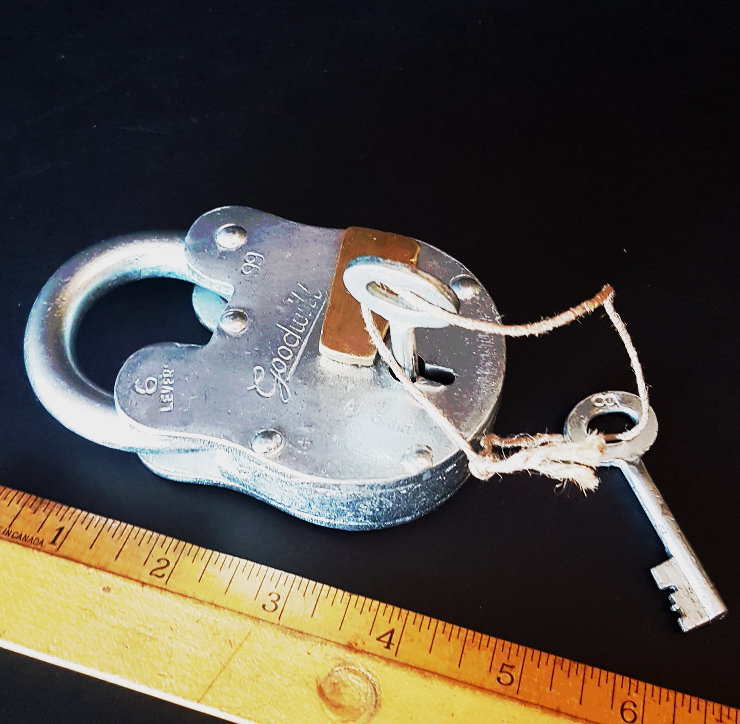 Heavy steel padlock 4.5 x 2.5 inches with 2 keys. Vintage silver polished finish. Antique nautical design. Multi purpose locking device.