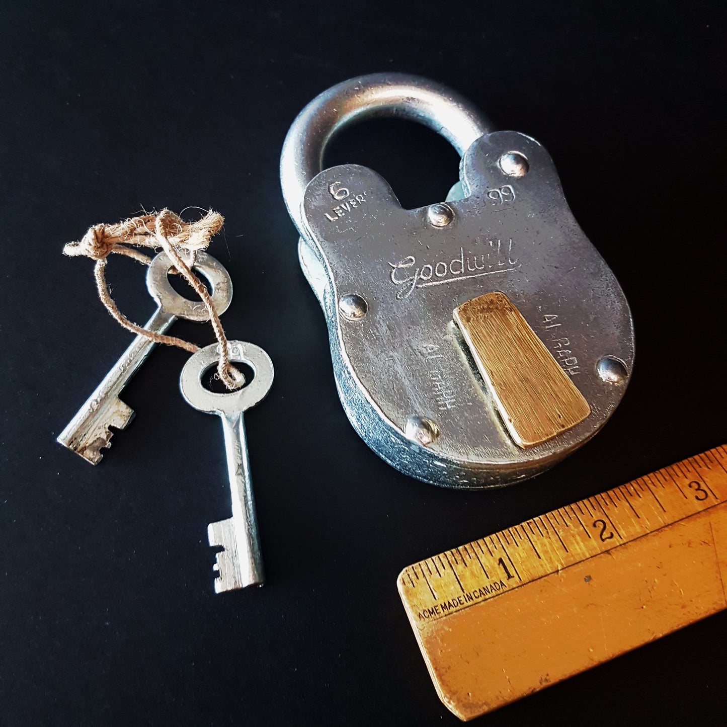 Heavy steel padlock 4.5 x 2.5 inches with 2 keys. Vintage silver polished finish. Antique nautical design. Multi purpose locking device.