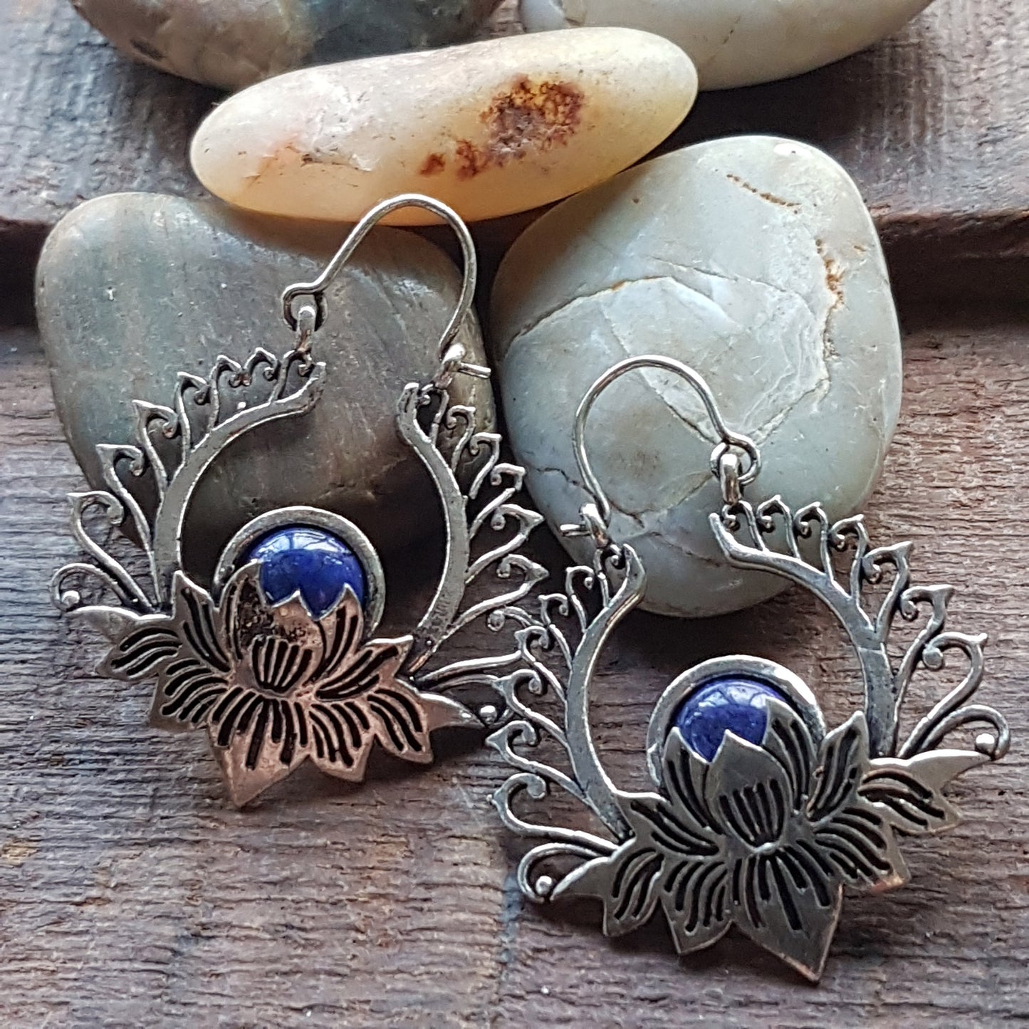 Fabulous silver lotus flower gemstone earrings. Esoteric and metaphysical theme jewelry. Large hanging earrings with semi precious stones.