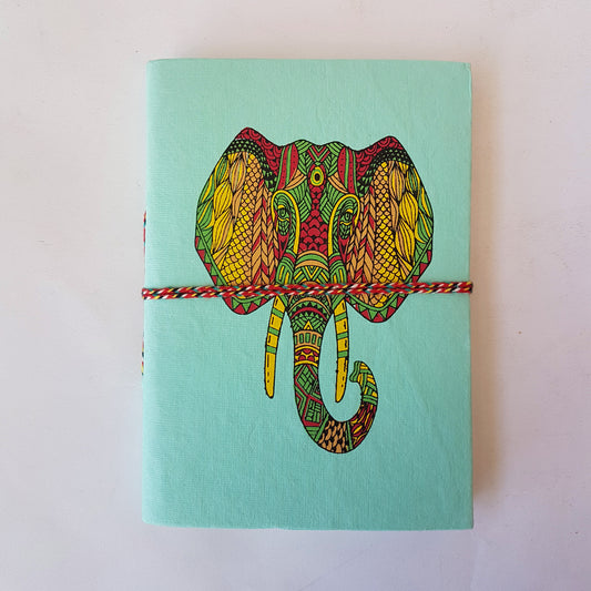 Elephant notebook journal 5x7 inches.Turquoise hand bound hard cover lined diary with a colorful psychedelic elephant design. Free shipping CA & USA.