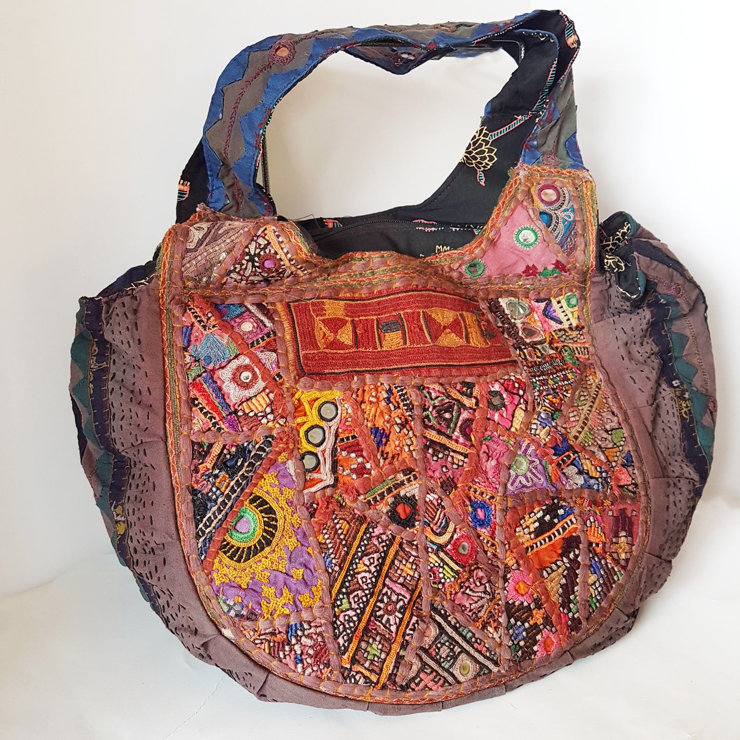 Banjara shoulder bag. Authentic vintage tribal gypsy storage bag in rich red & purple with embroidered mirror work. One of a kind beauty.