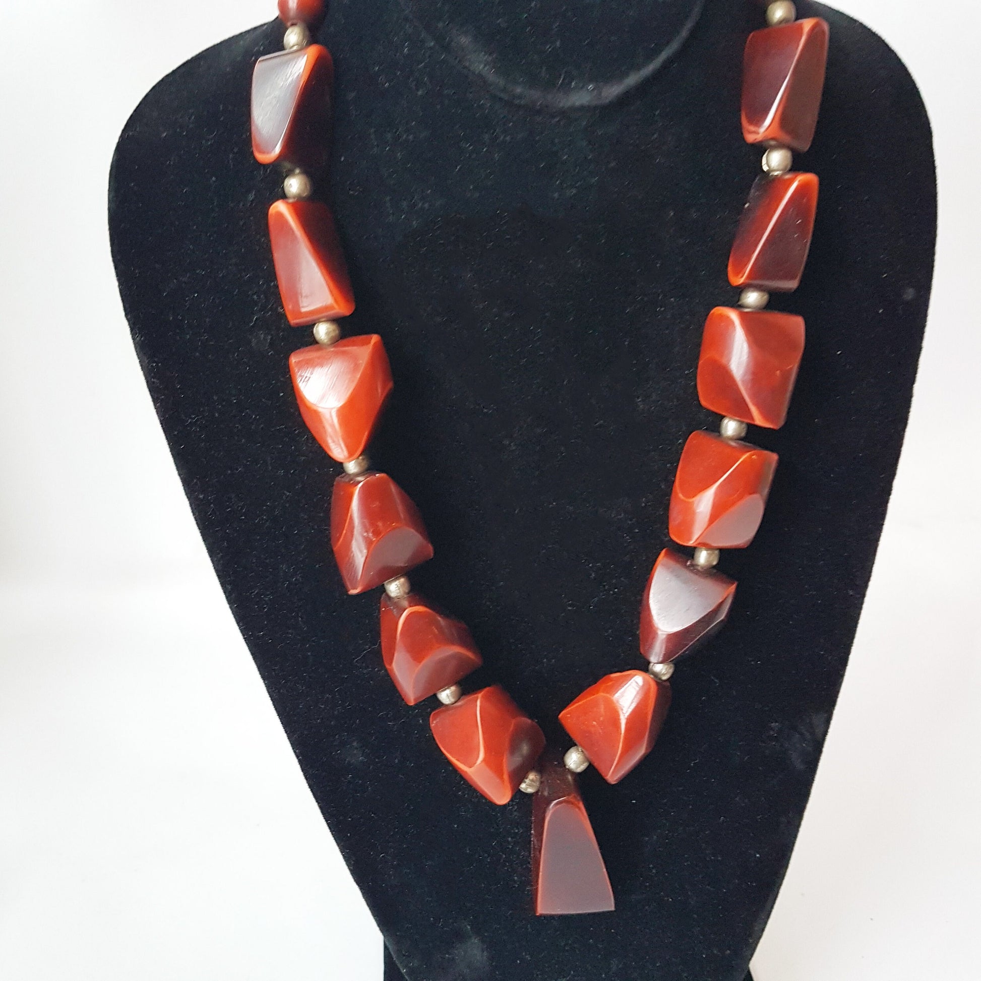 Vintage bohemian art deco pendant necklace 23 inches long. Polished Bauxite statement necklace with rich brown amber chunky beads. - Vintage India Ca
