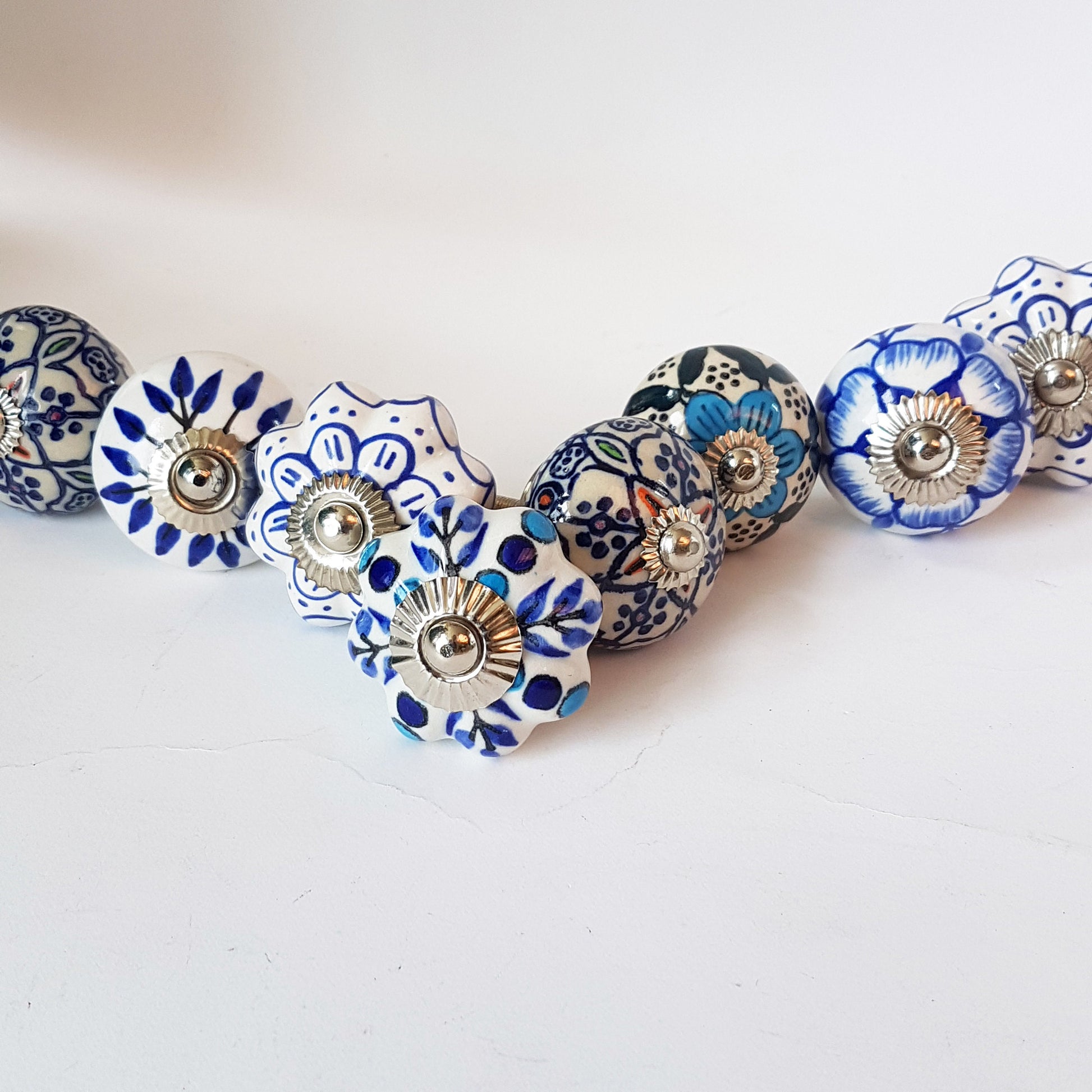 Delphine set of 8 cabinet knob drawer pulls. Designer collection in classic Delft Dutch blue & white floral patterns.  Easy DIY decor fix! - Vintage India Ca
