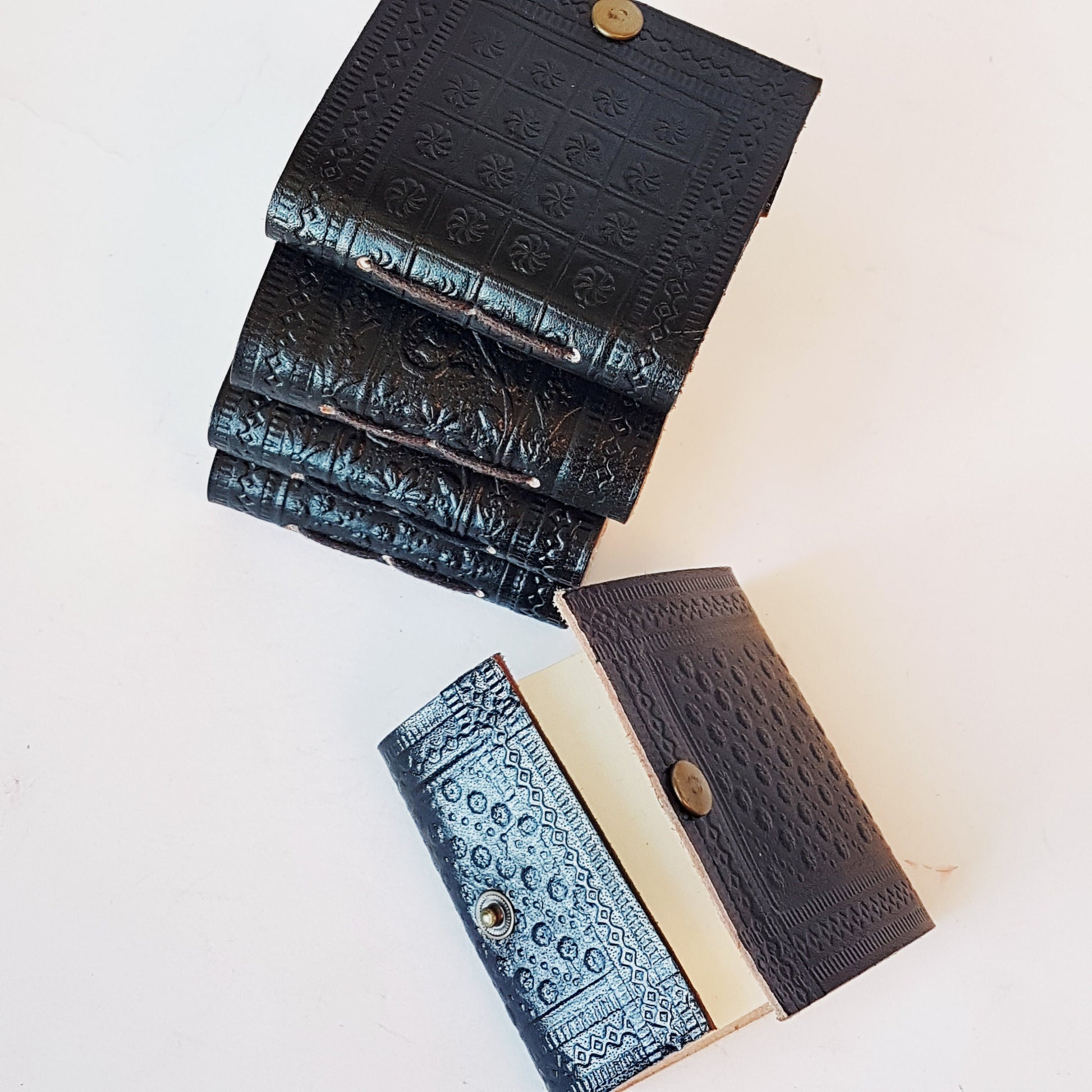 Set of 3 cute black leather bound miniature diary journals. Pocket grimoires with hand embossed floral designs 3 inch. Hand made paper. - Vintage India Ca