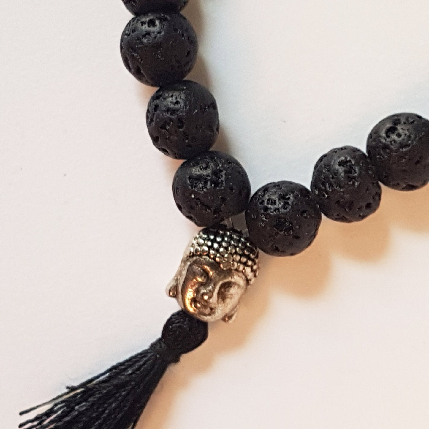 Natural black lava stone unisex meditation bracelet. Buddhist mala bracelet with silver buddha bead & black silk tassle. Yoga jewelry. - Vintage India Ca