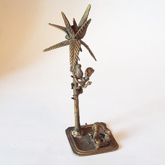 Vintage bronze monkey art sculpture. Monkey picking coconuts from tree. Animal metal collectable. India tribal art statue. 8 by 3 inches.. - Vintage India Ca