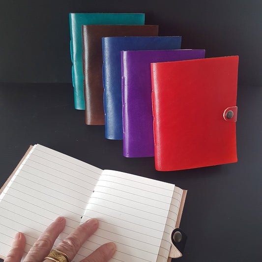 Leather bound lined journal with handmade artisan paper pages. Compact size 4.5 by 6 inches. Black, brown, red, turquoise, purple & blue. - Vintage India Ca