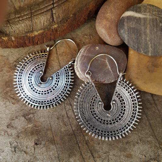 Silver filigree hanging disc earrings. Solid hoop tribal look earrings with an intricate geometric desgn. Also available in antique bronze. - Vintage India Ca