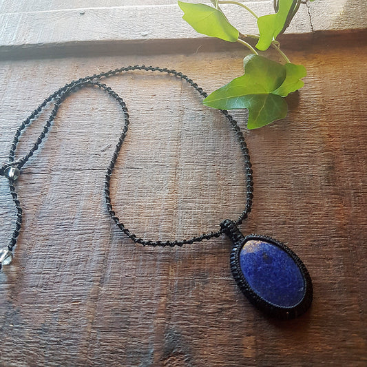 Gender neutral design lapis lazuli pendant necklace. Hangs on a 20 inch black woven corkscrew knot cord. Adjustable length. Unisex jewelry. - Vintage India Ca