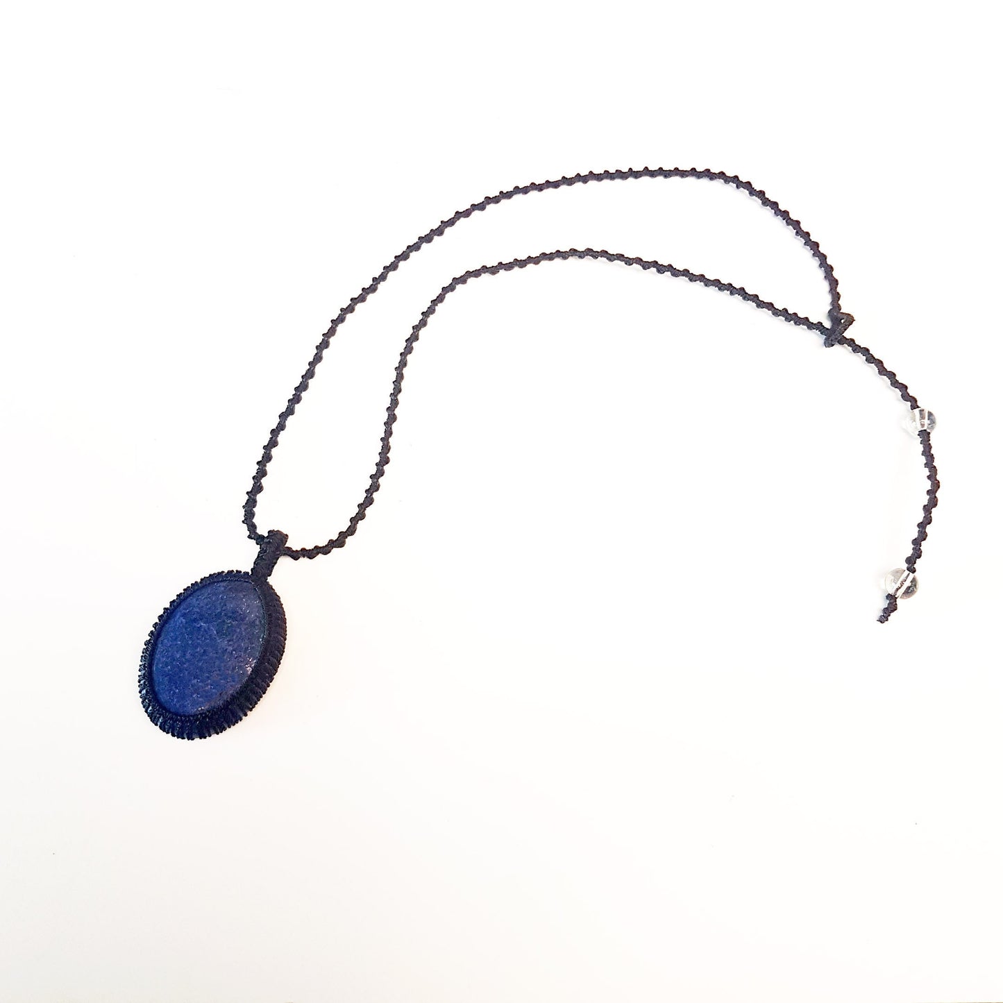 Gender neutral design lapis lazuli pendant necklace. Hangs on a 20 inch black woven corkscrew knot cord. Adjustable length. Unisex jewelry. - Vintage India Ca