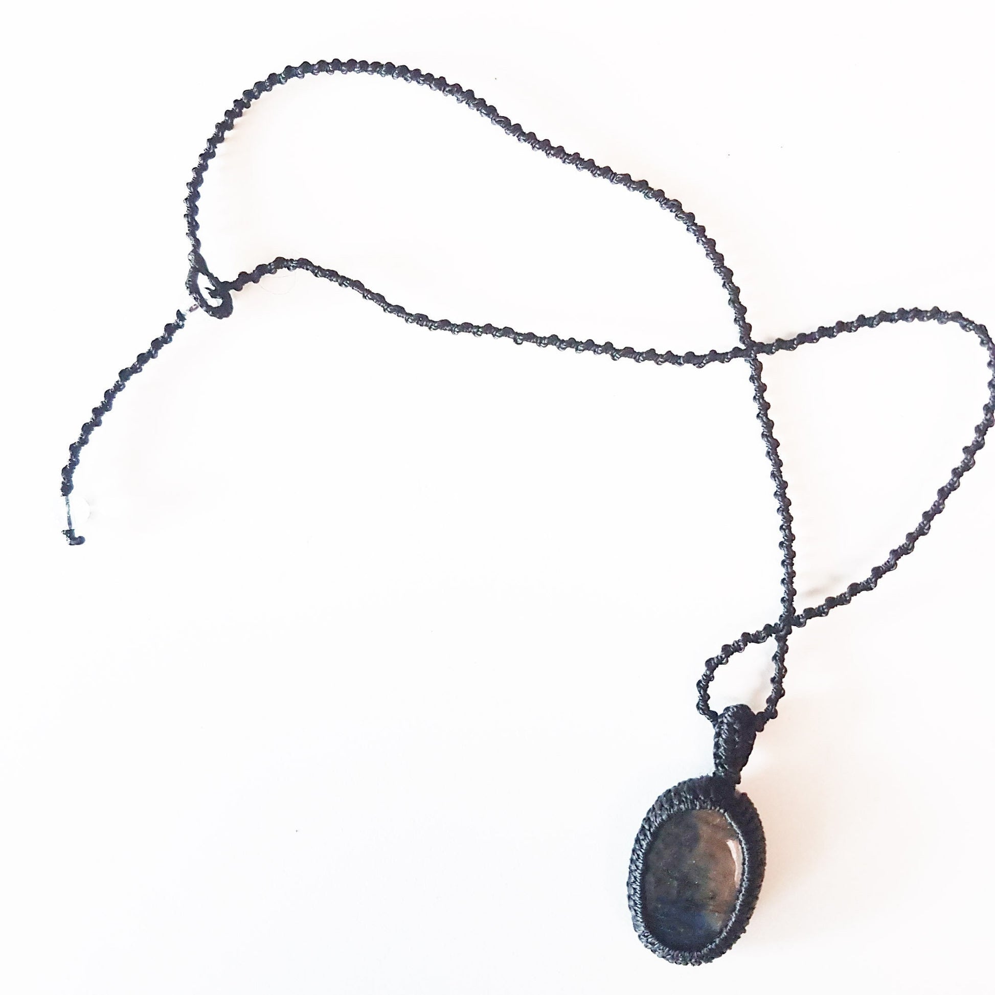 Gender neutral design labradorite pendant necklace. Hangs on a 20 inch black woven corkscrew knot cord. Adjustable length. Unisex jewelry. - Vintage India Ca