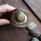 Vintage medieval style bronze cuff bracelet. Set with Tibetan turquoise & coral stones. Spectacular gender neutral golden tone armour cuff.