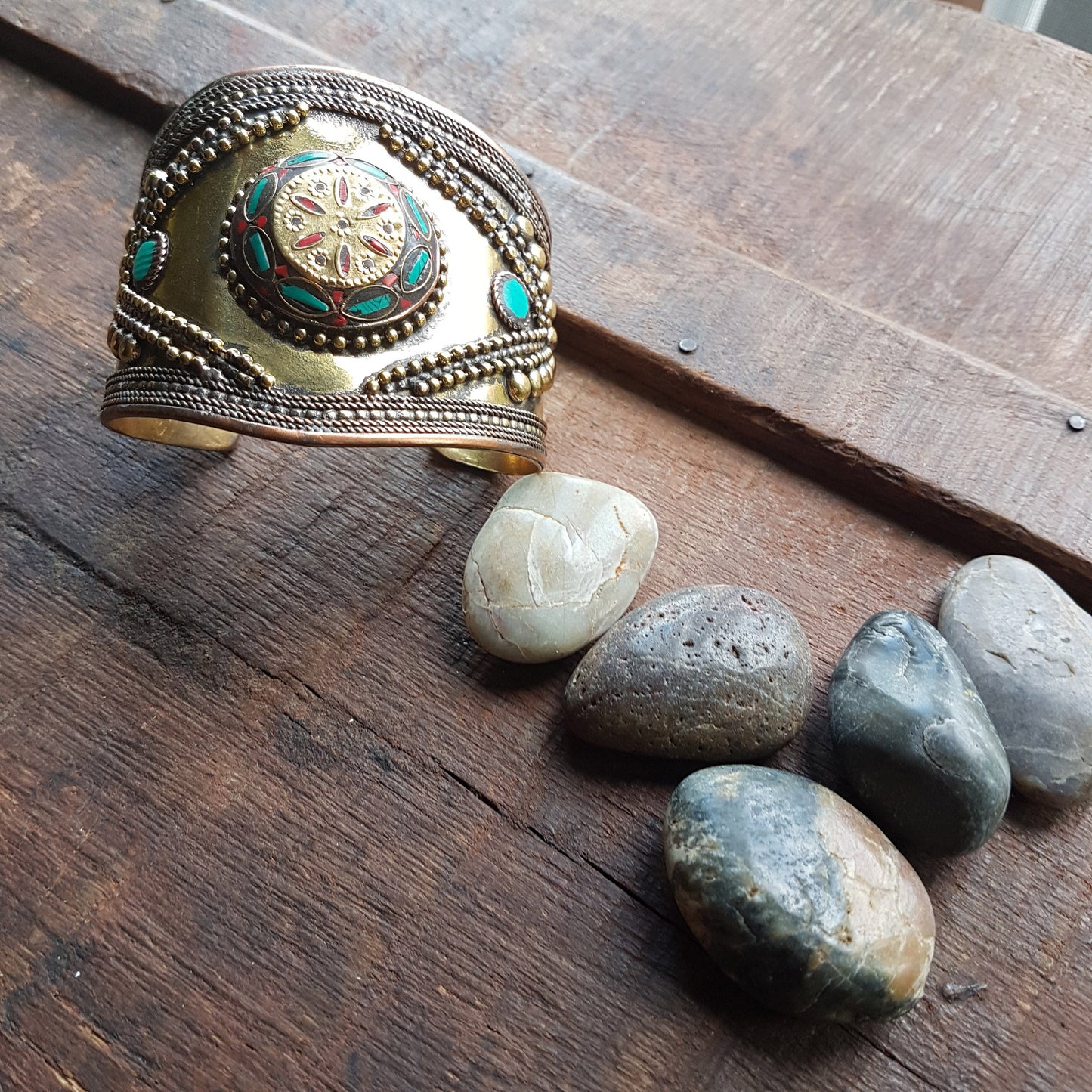 Vintage medieval style bronze cuff bracelet. Set with Tibetan turquoise & coral stones. Spectacular gender neutral golden tone armour cuff.