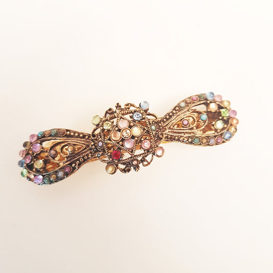 Barrette à cheveux en strass vintage. Bijoux de cheveux finition argent antique. Barrette à cheveux en forme de nœud parsemée de pierres colorées. 3,75 pouces.