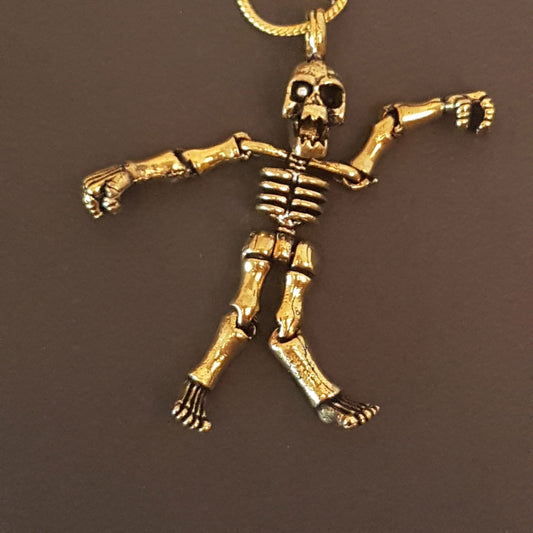 Day of the Dead skeleton pendant necklace on 20 inch chain. Articulated limb Gothic skeleton puppet pendant. Available in gold or silver. - Vintage India Ca