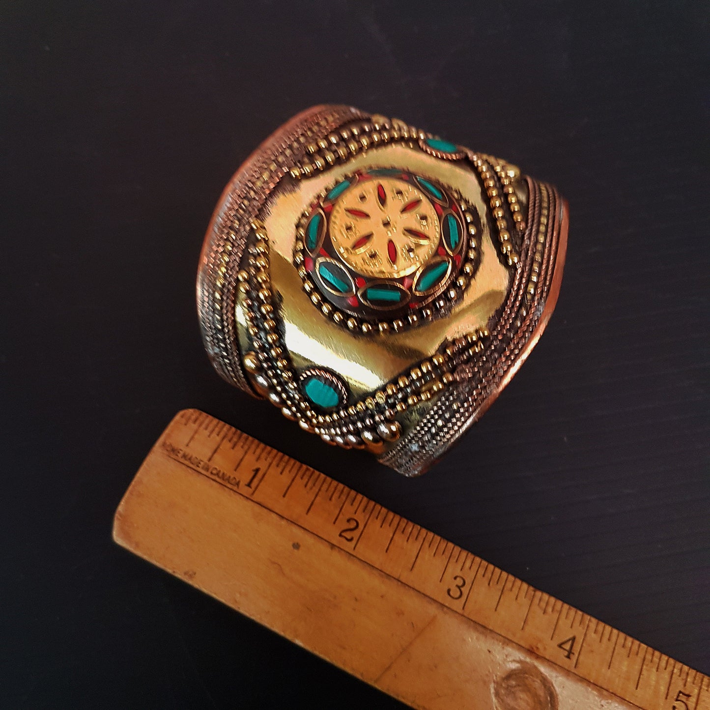 Vintage medieval style bronze cuff bracelet. Set with Tibetan turquoise & coral stones. Spectacular gender neutral golden tone armour cuff.