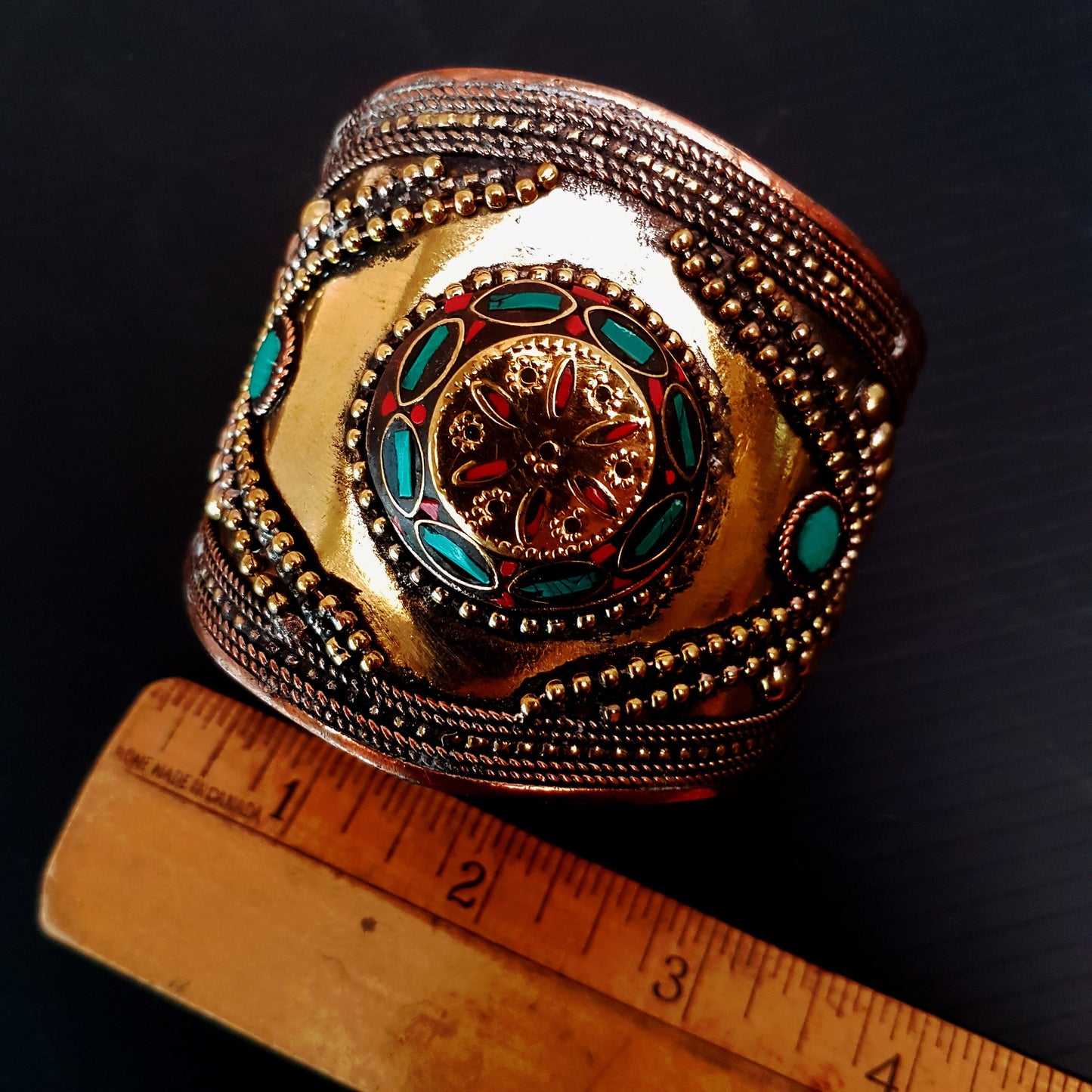 Vintage medieval style bronze cuff bracelet. Set with Tibetan turquoise & coral stones. Spectacular gender neutral golden tone armour cuff.