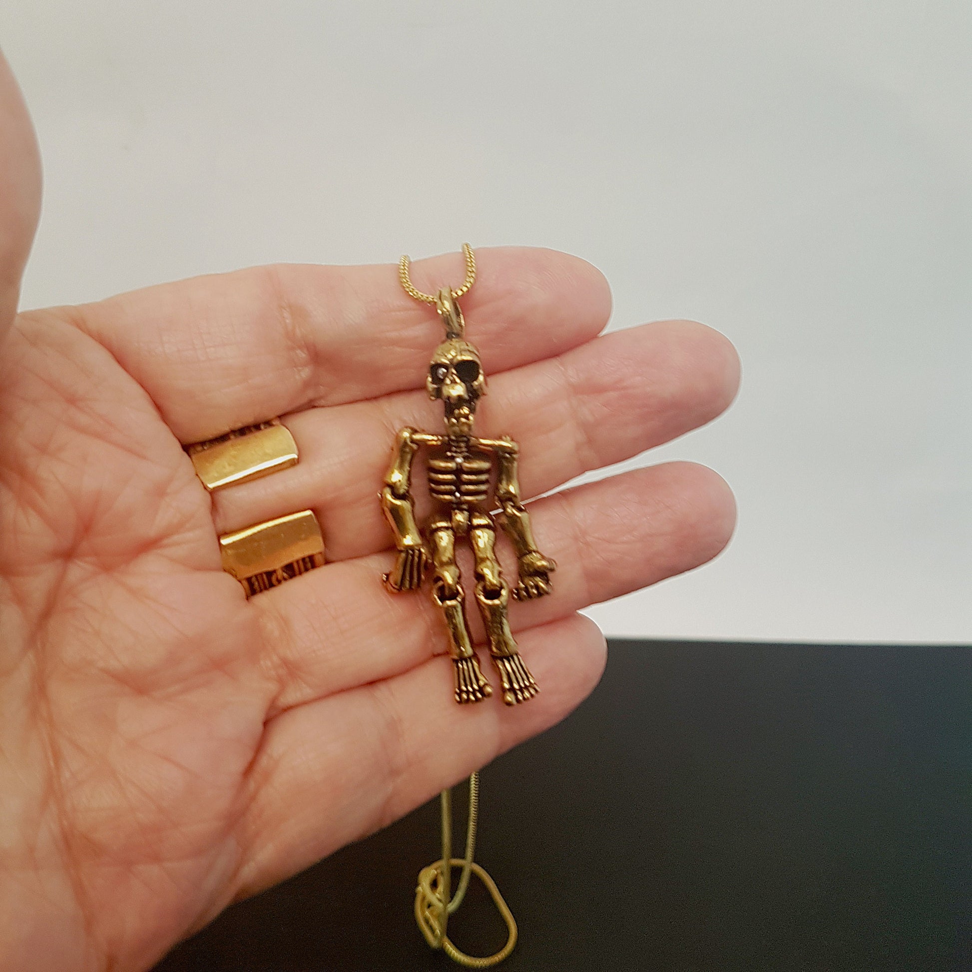 Gold sale skeleton pendant