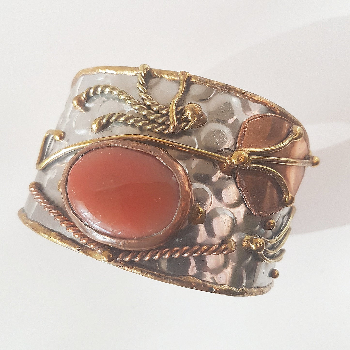 Vintage silver cuff bracelet with a large oval carnelian stone. Celtic trimetal medieval handwrought design. Copper & brass on silver metal. - Vintage India Ca