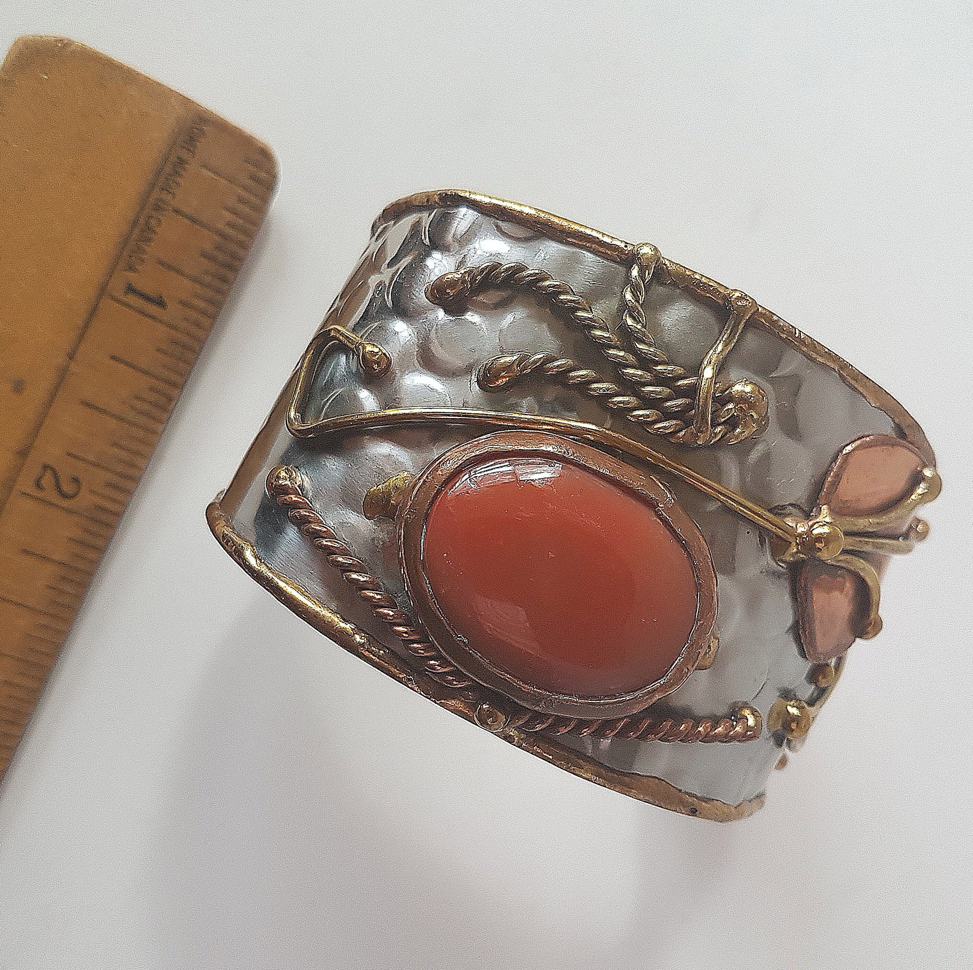 Vintage silver cuff bracelet with a large oval carnelian stone. Celtic trimetal medieval handwrought design. Copper & brass on silver metal. - Vintage India Ca