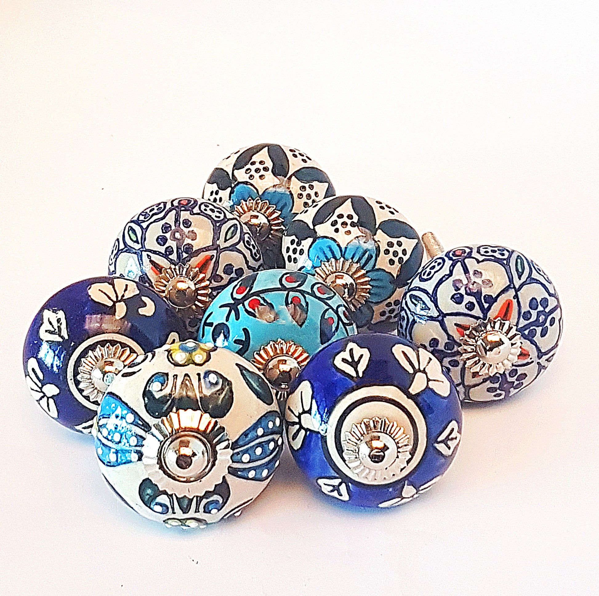 Set of 8 hand painted cabinet knob drawer pulls in vintage designs. Exclusive Farmhouse Blue collection of 8 furniture hardware knob pulls. - Vintage India Ca